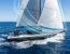 Voilier en mer avec des lignes bleues illustrant le flux d'air autour des voiles.